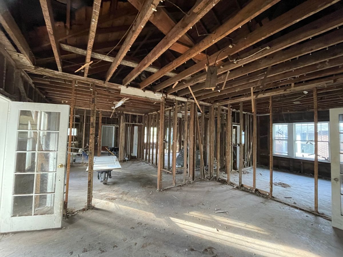 The interior stripped to studs and ceiling joists